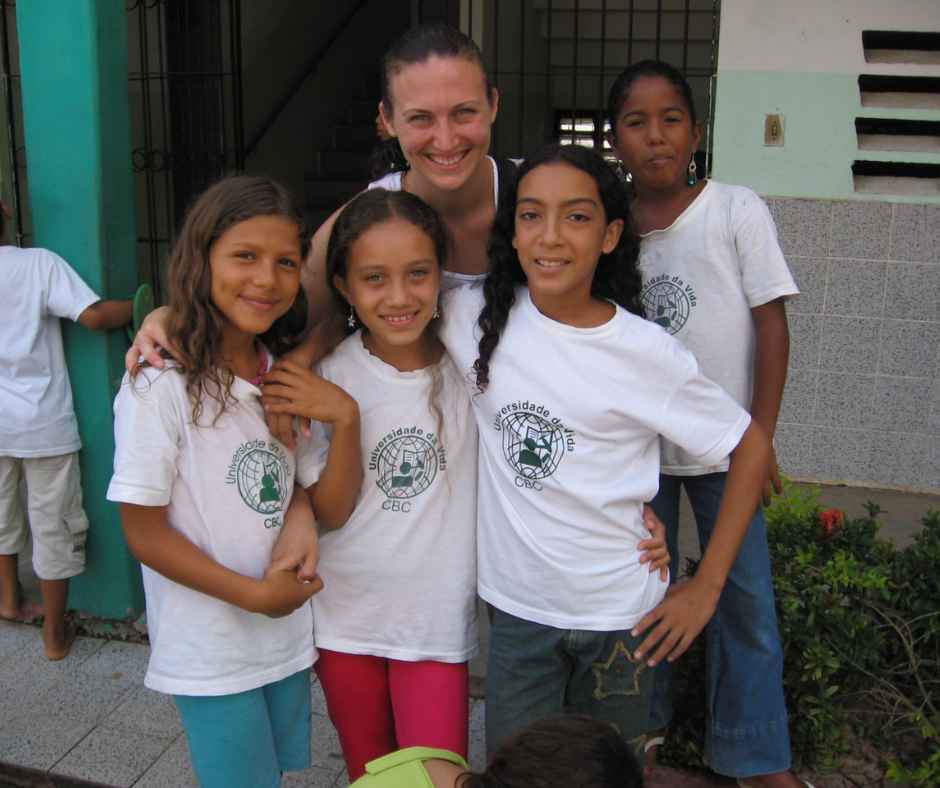 volunteer with girls at CBC