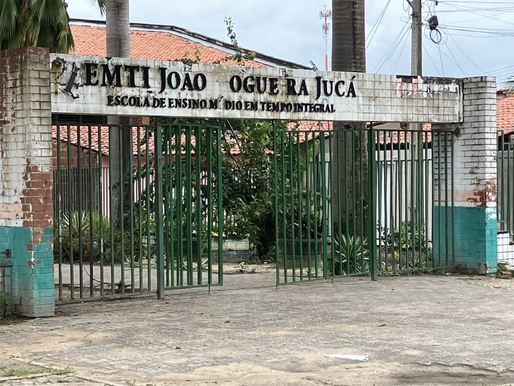 Gate to school in the favalas on a Sunday morning