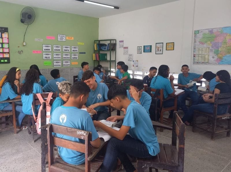 Year 8 & 9 students doing group activities in the classroom.