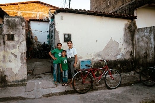 Family outside their home